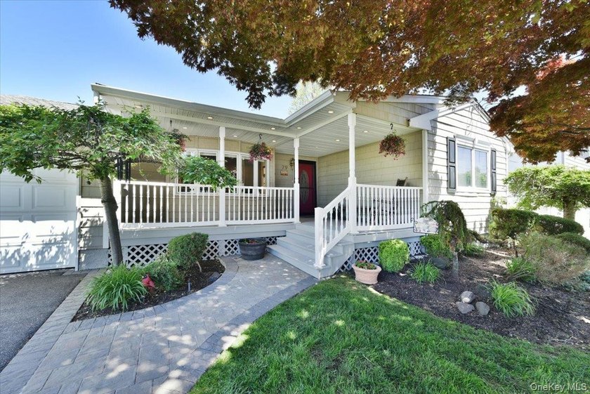 Beautifully maintained 3-bedroom, 2.5-bath ranch located in the - photo 3