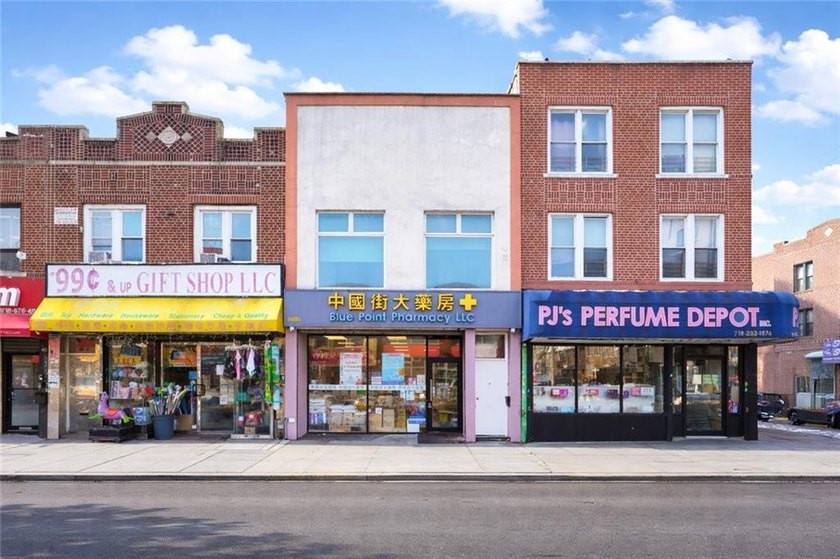Prime mixed-use brick building located in the heart of the - photo 2