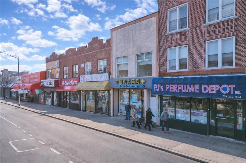 Prime mixed-use brick building located in the heart of the - photo 5