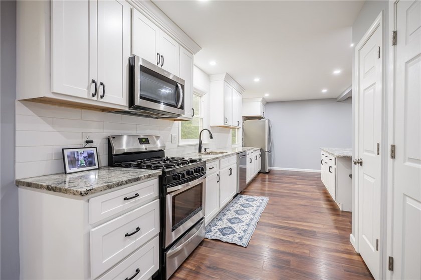 Welcome to 10 Gueymar Circle, a spacious 4-bedroom, 3-bath - photo 13