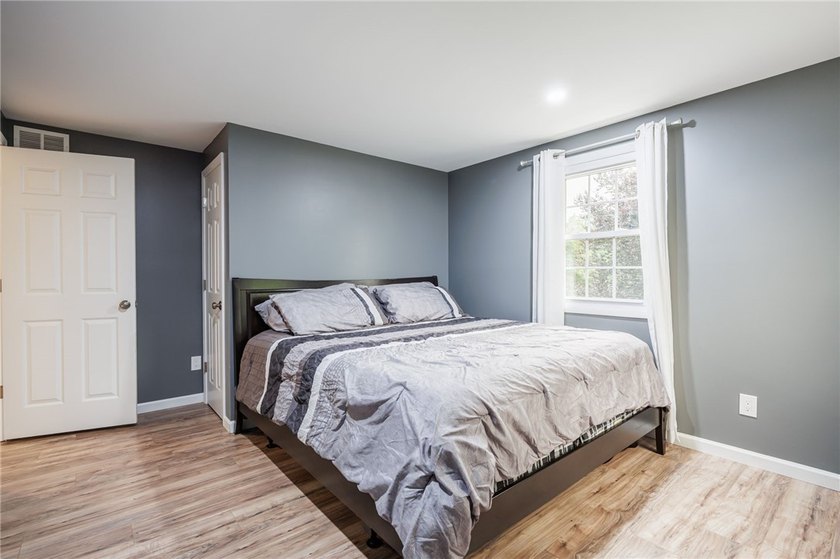 Welcome to 10 Gueymar Circle, a spacious 4-bedroom, 3-bath - photo 22