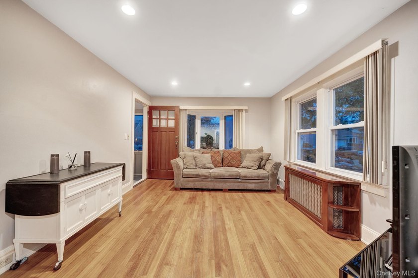 Filled with warmth and opportunity, this 3 bedroom, 1 bath Cape - photo 9