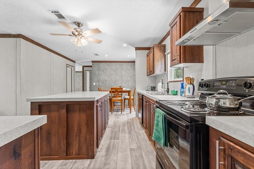 Looking for privacy, acreage, and room to roam? This like-new - photo 3