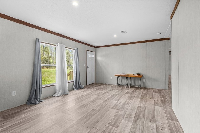 Looking for privacy, acreage, and room to roam? This like-new - photo 8
