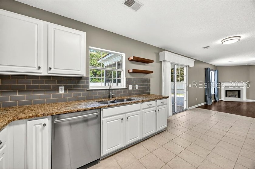Set on a quiet cul-de-sac, 41 Lakeside Drive offers a sense of - photo 12