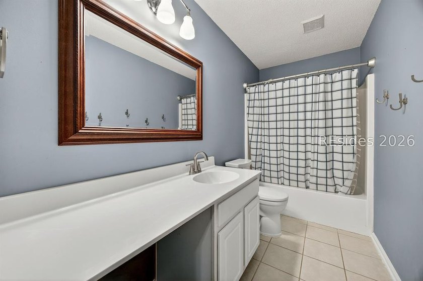 Set on a quiet cul-de-sac, 41 Lakeside Drive offers a sense of - photo 34