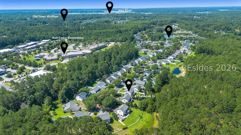 Set on a quiet cul-de-sac, 41 Lakeside Drive offers a sense of - photo 49