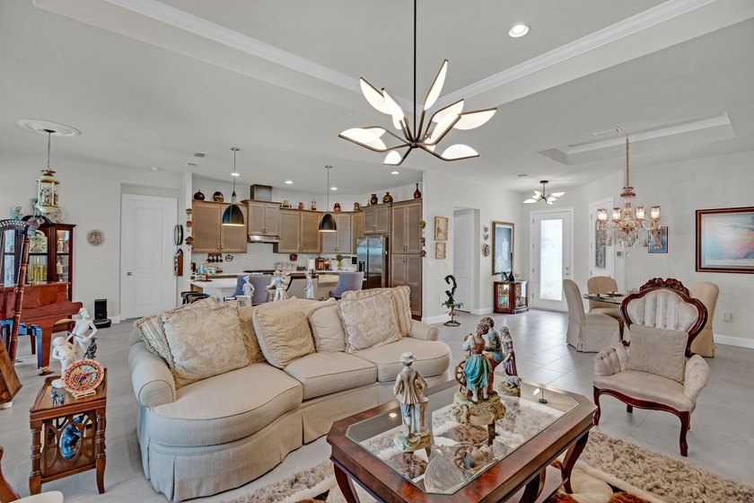 This stunning corner-lot home offers breathtaking lake views and - photo 11