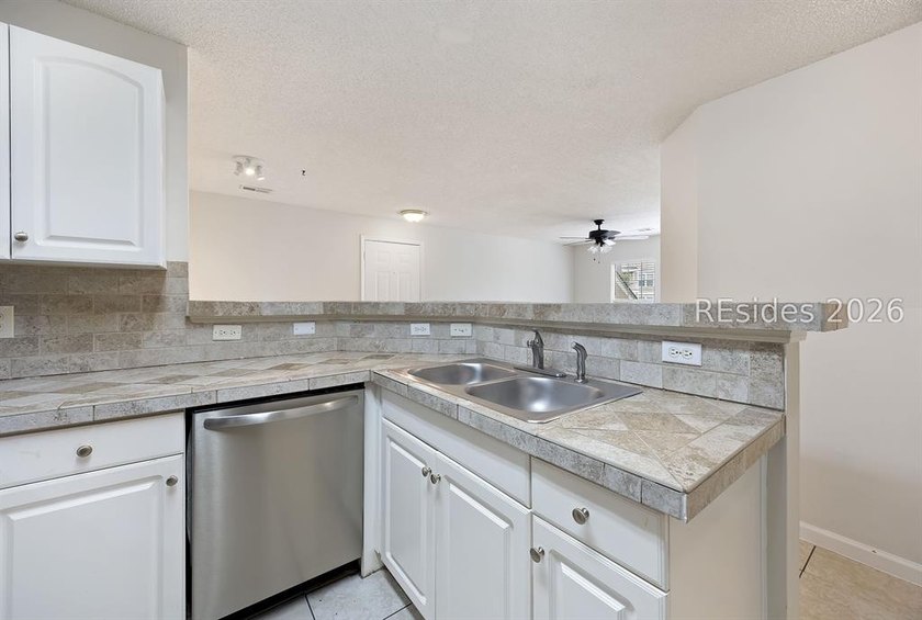 This 3BR/2BA villa at The Estate at Westbury offers a bright - photo 15