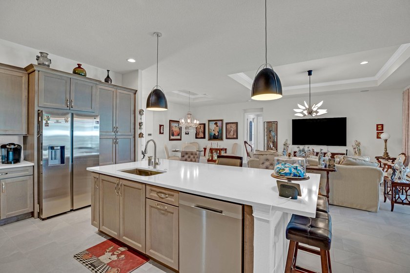 This stunning corner-lot home offers breathtaking lake views and - photo 16