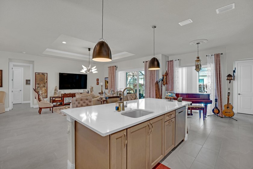This stunning corner-lot home offers breathtaking lake views and - photo 17