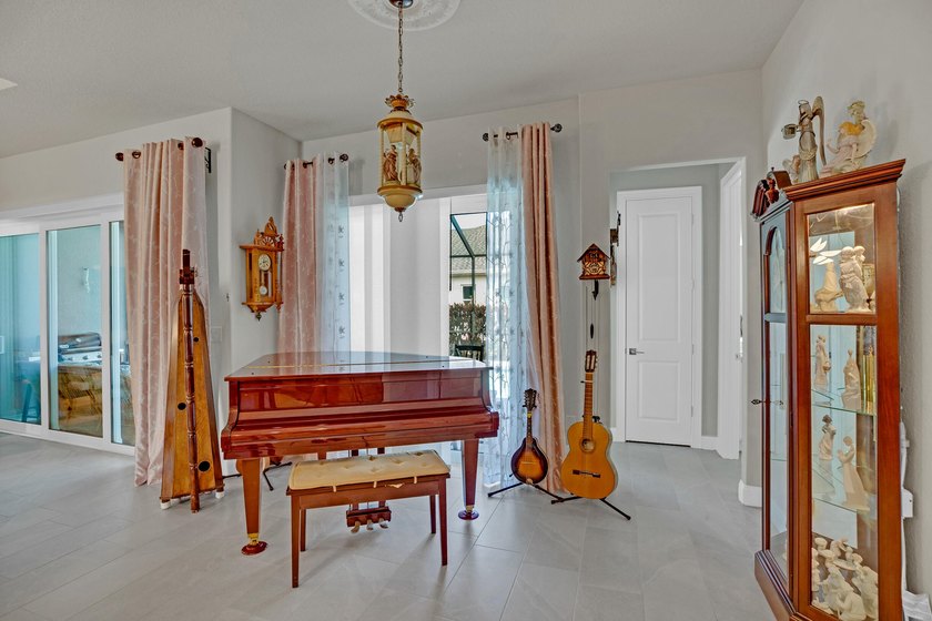 This stunning corner-lot home offers breathtaking lake views and - photo 19