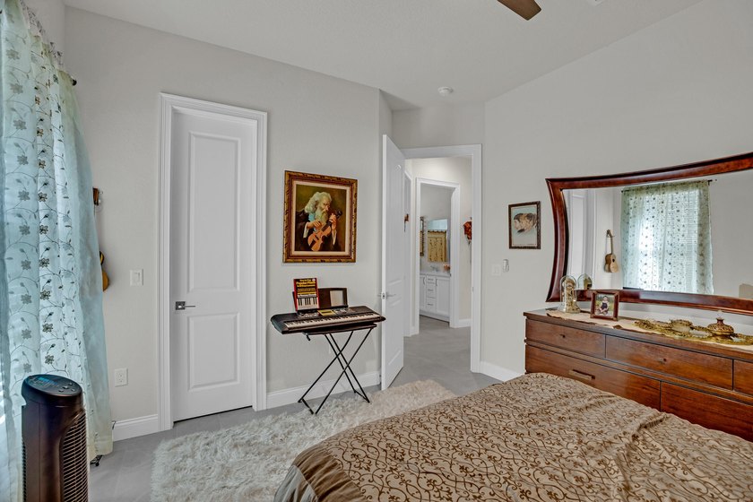 This stunning corner-lot home offers breathtaking lake views and - photo 22