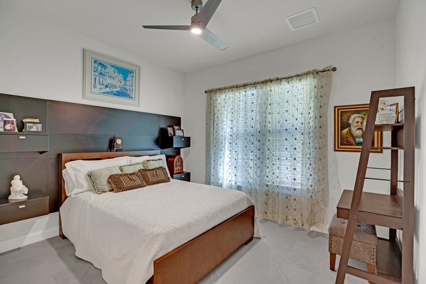 This stunning corner-lot home offers breathtaking lake views and - photo 23