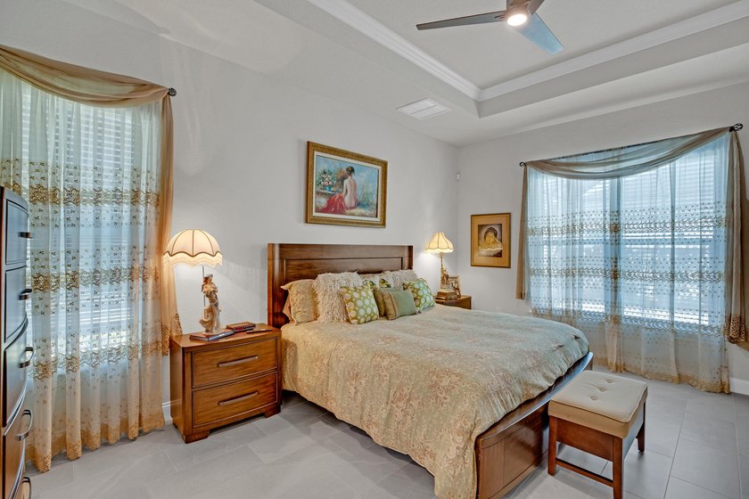 This stunning corner-lot home offers breathtaking lake views and - photo 29