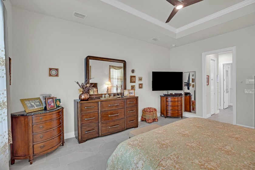 This stunning corner-lot home offers breathtaking lake views and - photo 30