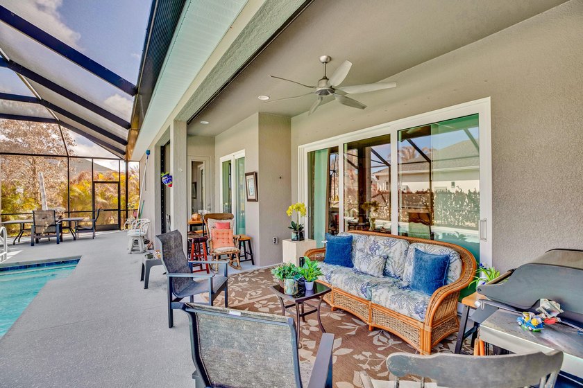 This stunning corner-lot home offers breathtaking lake views and - photo 37