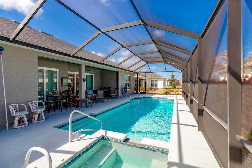 This stunning corner-lot home offers breathtaking lake views and - photo 41