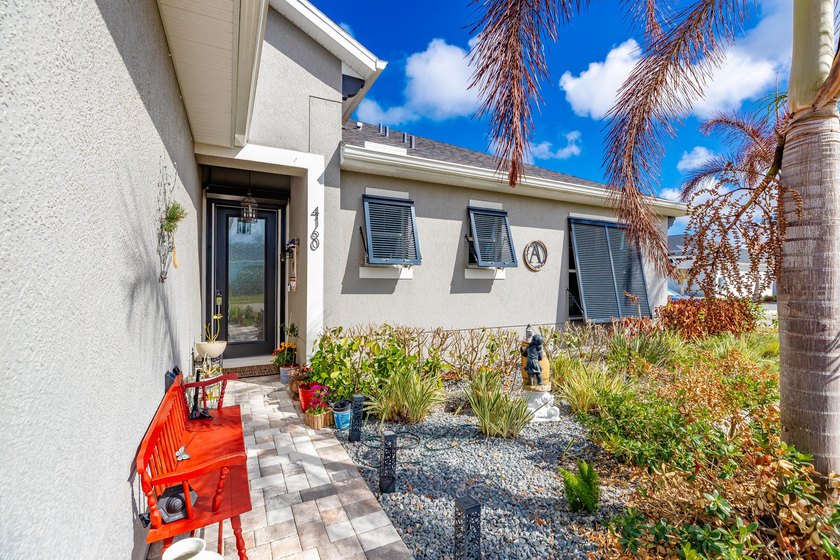This stunning corner-lot home offers breathtaking lake views and - photo 42