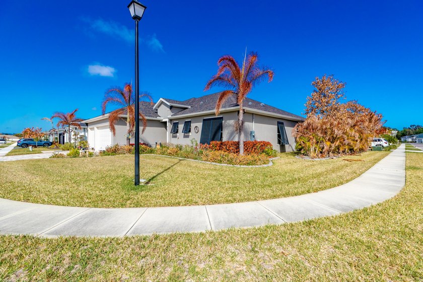This stunning corner-lot home offers breathtaking lake views and - photo 44
