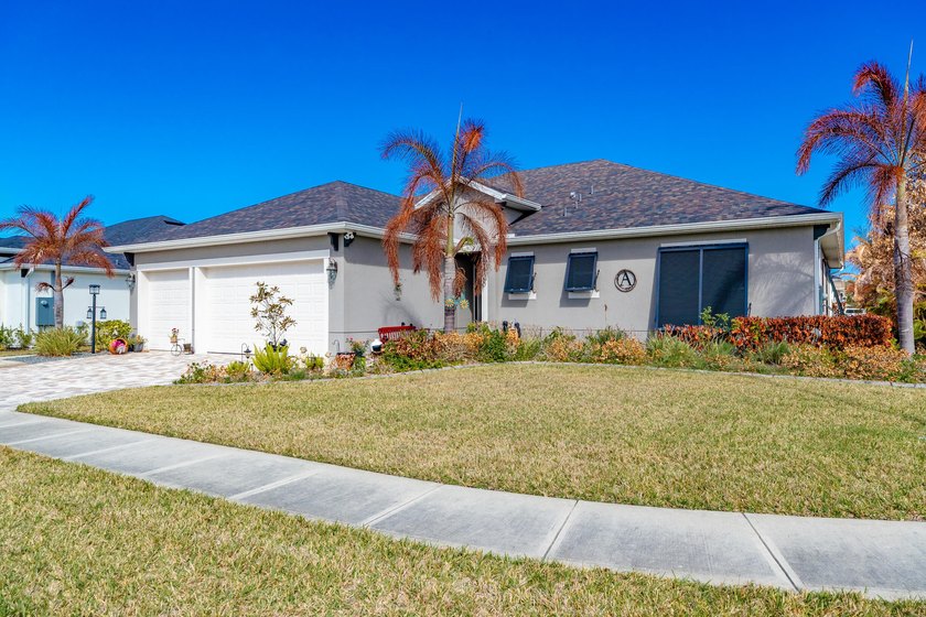 This stunning corner-lot home offers breathtaking lake views and - photo 45