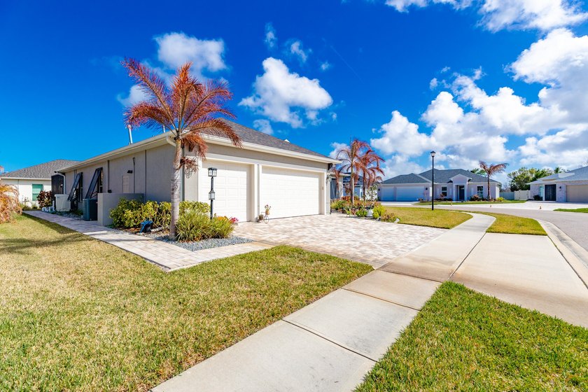 This stunning corner-lot home offers breathtaking lake views and - photo 47