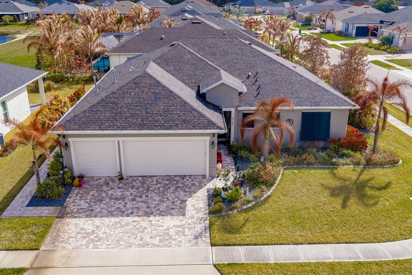 This stunning corner-lot home offers breathtaking lake views and - photo 49