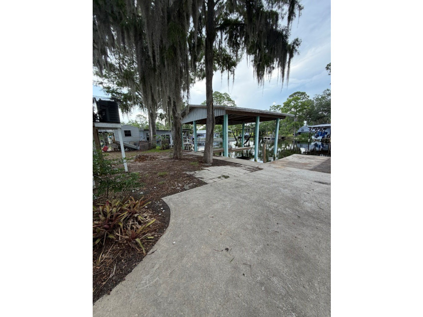 Waterfront paradise with incredible potential! This elevated - photo 4