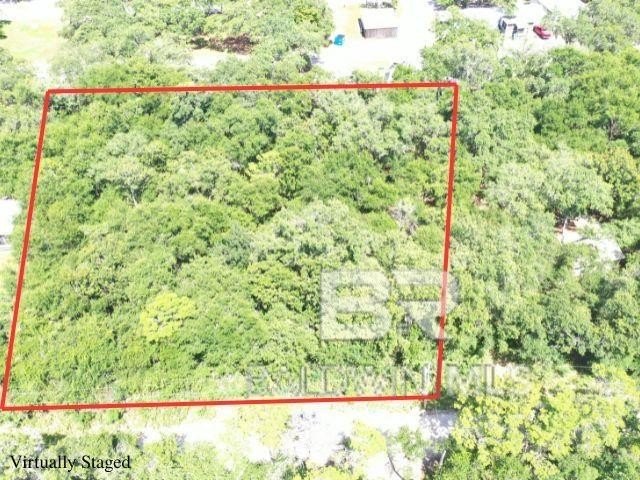 Build your dream home on this .70 acre lot off Fort Morgan Rd in - photo 3