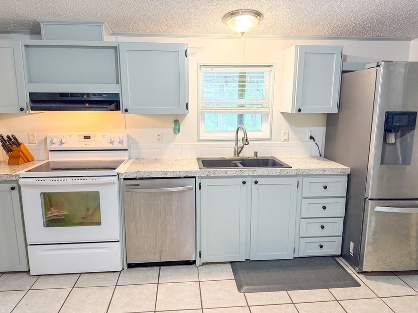 Wake up to breathtaking views of the Suwannee River from this - photo 9