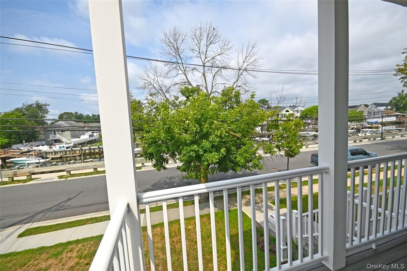 Spacious Waterfront Almost New Construction | 5 Bed | 3 Bath | - photo 8