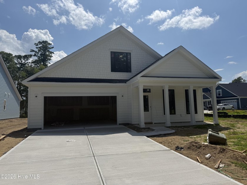 The Fullerton is a two-story Craftsman-style home offering three - photo 27