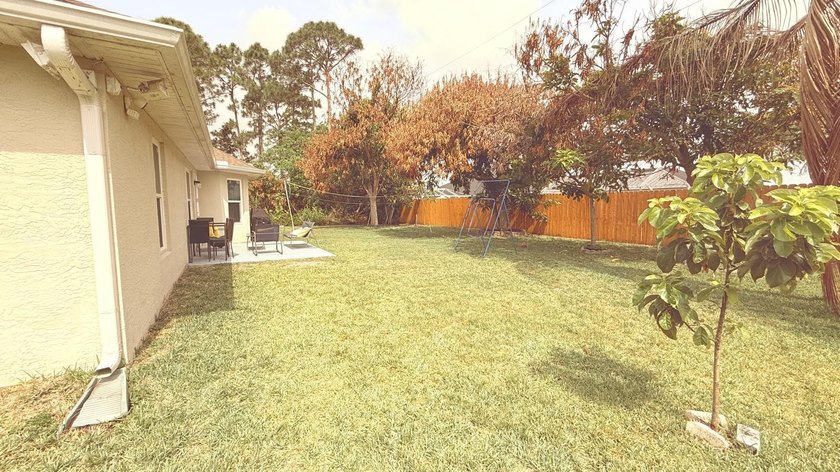 Welcome to this beautifully maintained Port St. Lucie home - photo 32