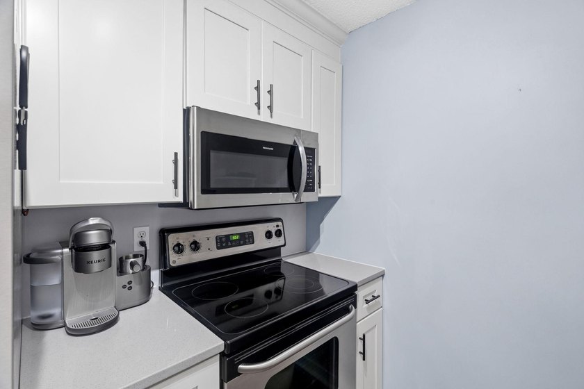 Completely updated and move-in ready, this ideally located condo - photo 9