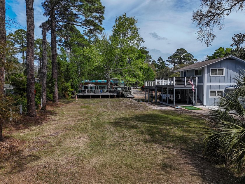 WATERFRONT BUILDABLE LOT! Build your dream home on this canal - photo 13