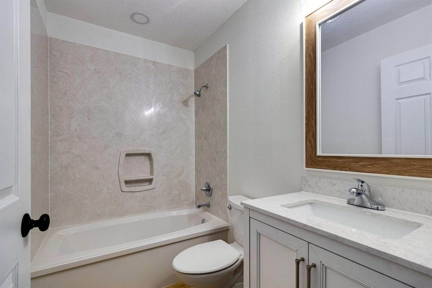 Welcome to your new home! This beautifully remodeled brick home - photo 17