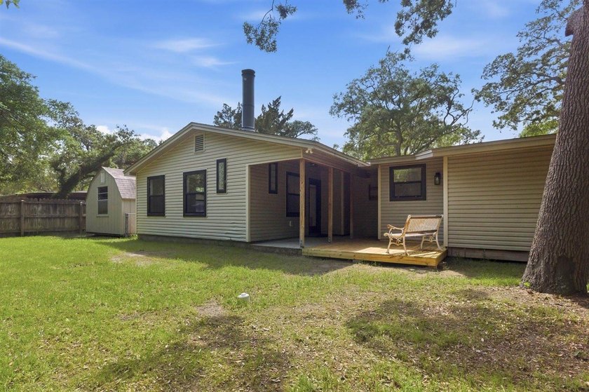 Welcome to your new home! This beautifully remodeled brick home - photo 33