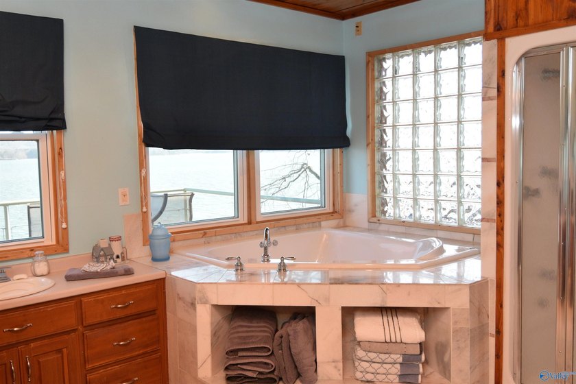 Located on the main channel of Lake Guntersville, this stunning - photo 11
