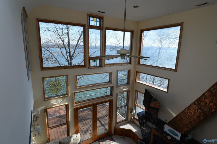 Located on the main channel of Lake Guntersville, this stunning - photo 19
