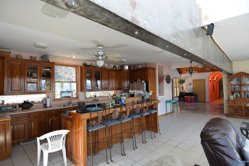 Located on the main channel of Lake Guntersville, this stunning - photo 23