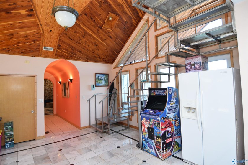 Located on the main channel of Lake Guntersville, this stunning - photo 27