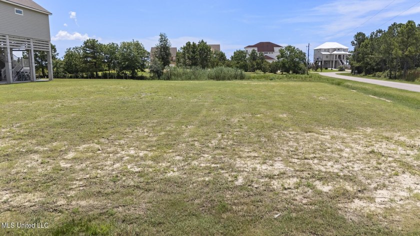 WATERFRONT LOT ON THE SOUTH SIDE OF DIAMONDHEAD. EASY ACCESS TO - photo 12