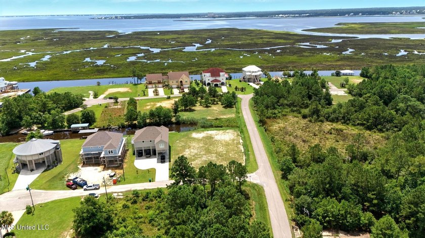 WATERFRONT LOT ON THE SOUTH SIDE OF DIAMONDHEAD. EASY ACCESS TO - photo 14