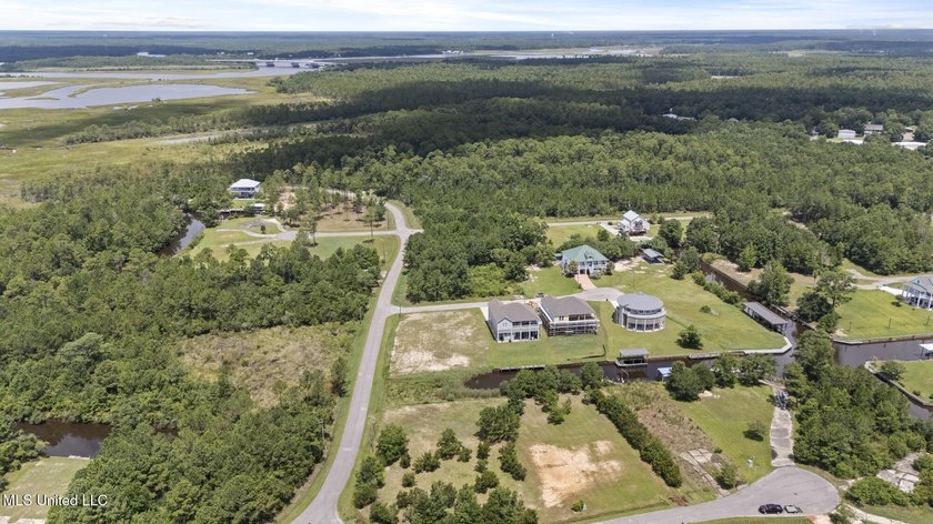 WATERFRONT LOT ON THE SOUTH SIDE OF DIAMONDHEAD. EASY ACCESS TO - photo 17