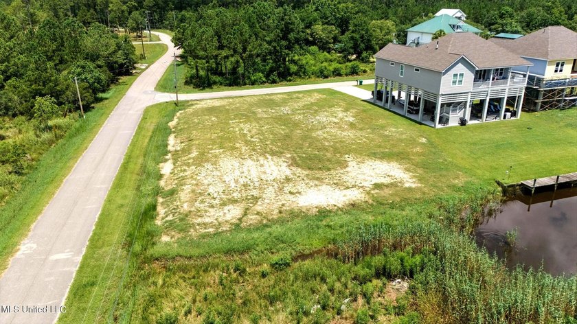 WATERFRONT LOT ON THE SOUTH SIDE OF DIAMONDHEAD. EASY ACCESS TO - photo 22