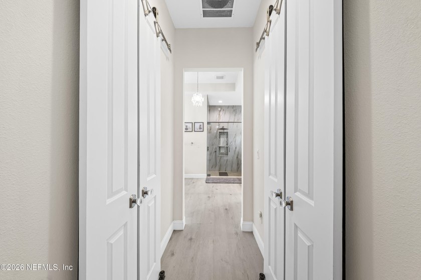 Built in 2023, this exceptional all-brick estate is tucked - photo 22