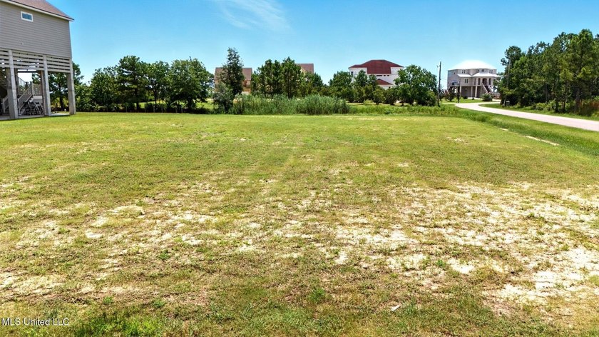 WATERFRONT LOT ON THE SOUTH SIDE OF DIAMONDHEAD. EASY ACCESS TO - photo 25
