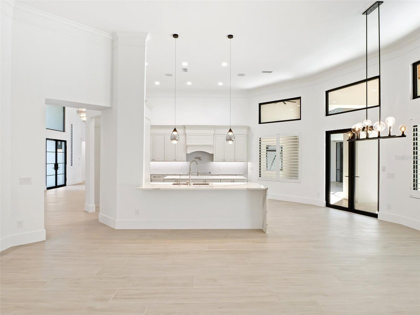 Set within the gates of renowned Isleworth, this beautifully - photo 13