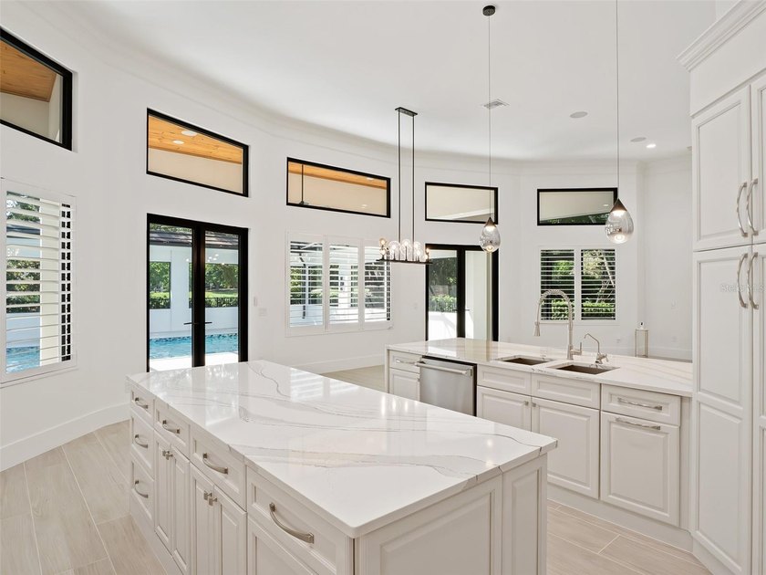 Set within the gates of renowned Isleworth, this beautifully - photo 17