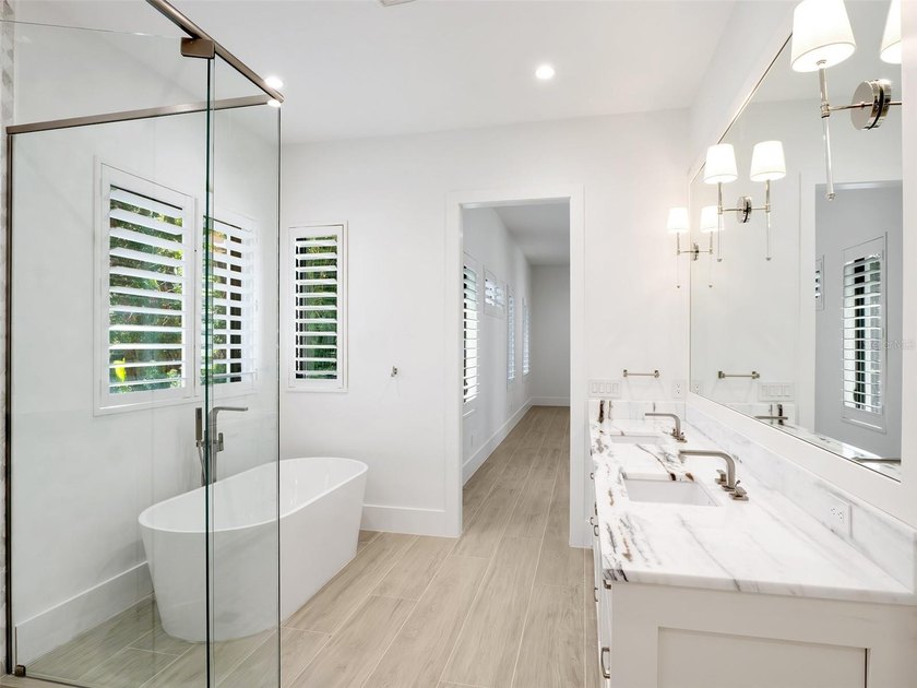 Set within the gates of renowned Isleworth, this beautifully - photo 21